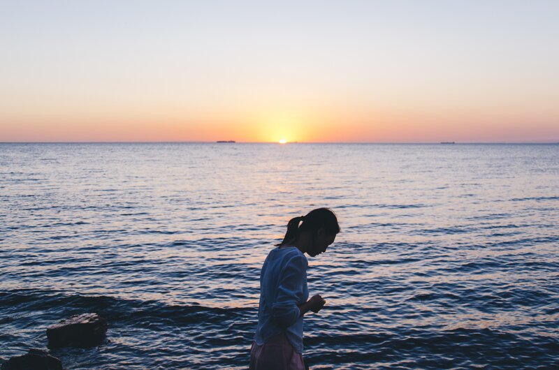 Woman at Ocean Sunset — Blue