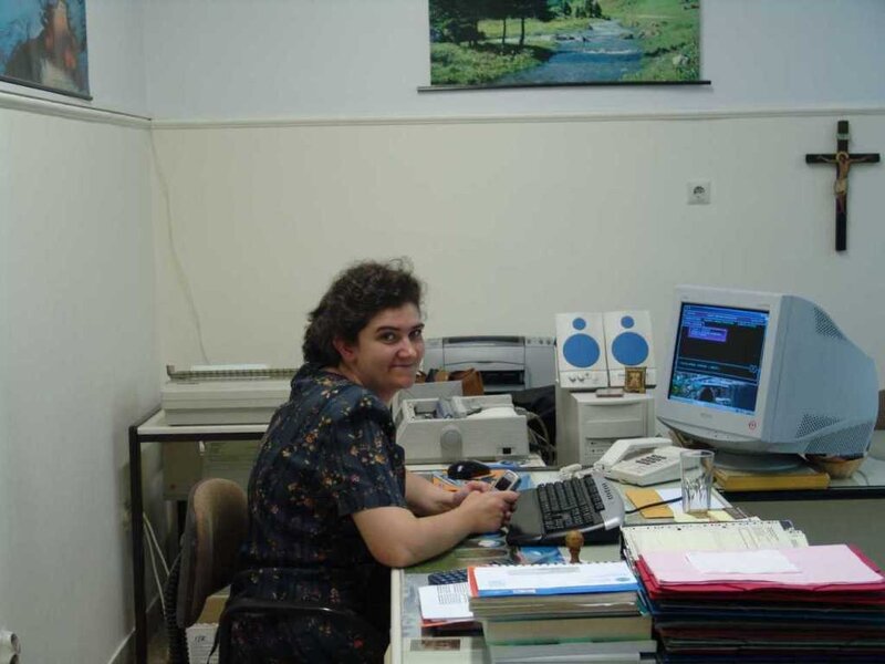 Woman at Office Desk — White