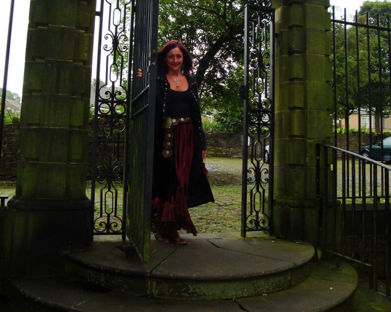Woman at ornate gate