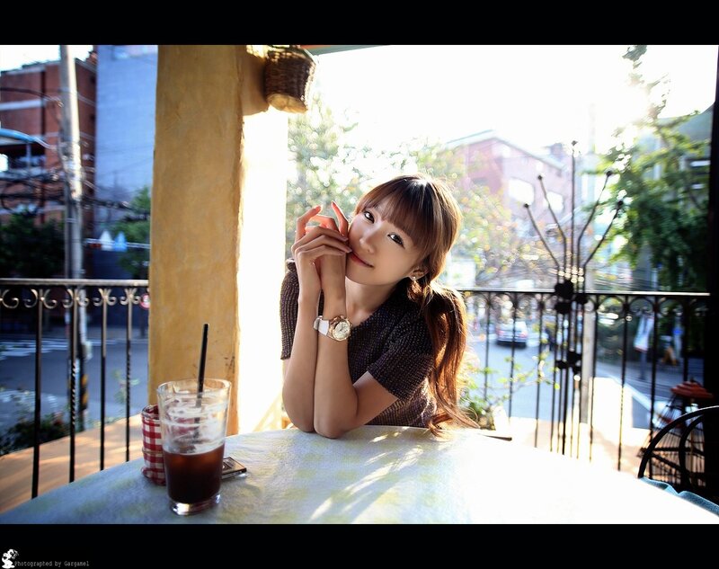 woman at outdoor cafe table