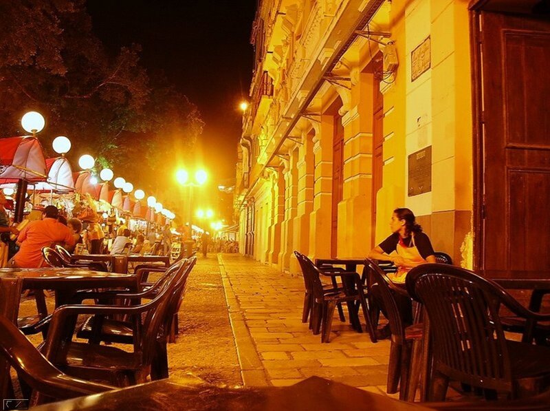 Woman at Outdoor Cafe — Yellow