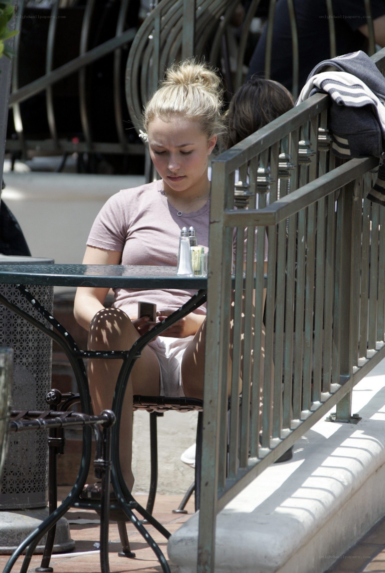 woman at outdoor table