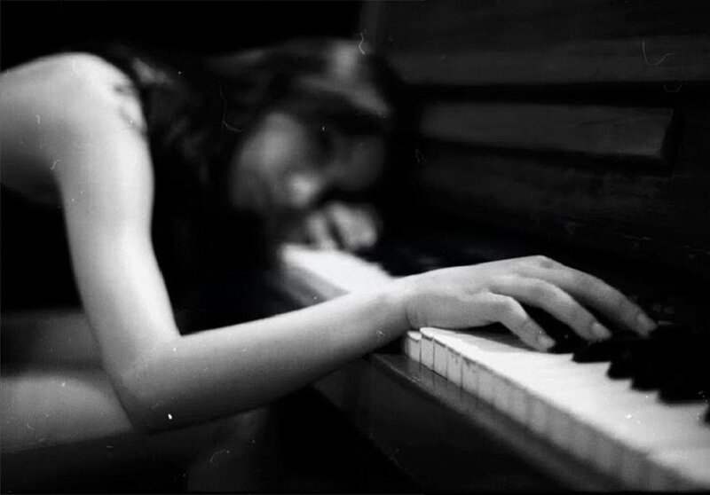 Woman at Piano Keyboard