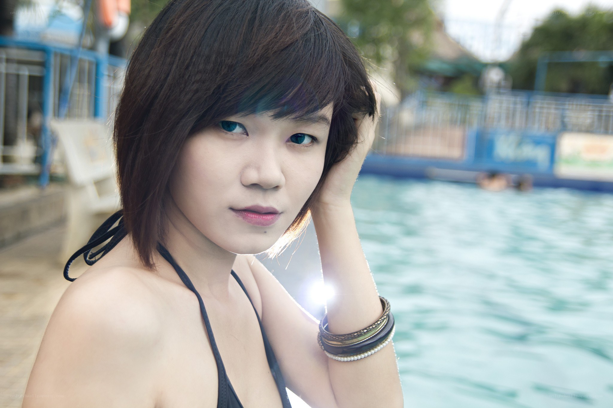 woman at poolside