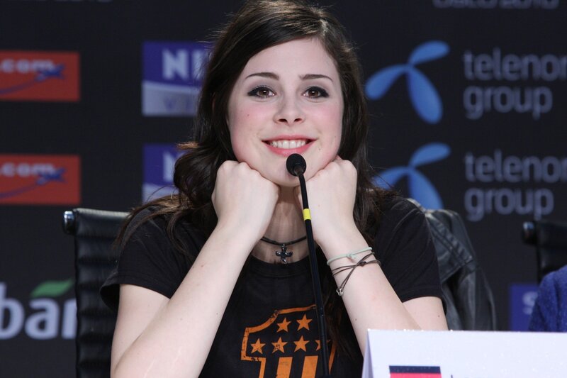 woman at press conference smiling