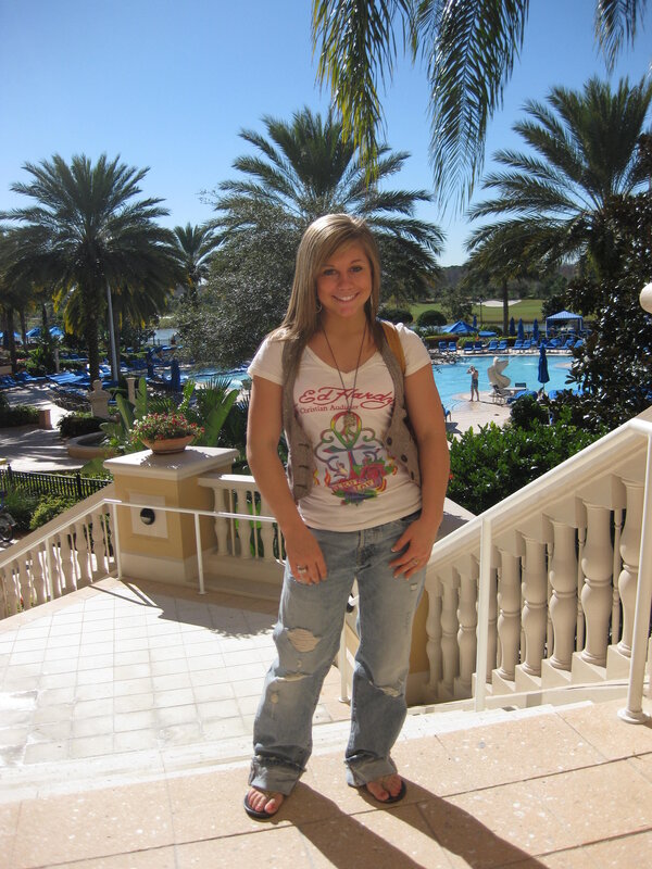 Woman at resort pool area