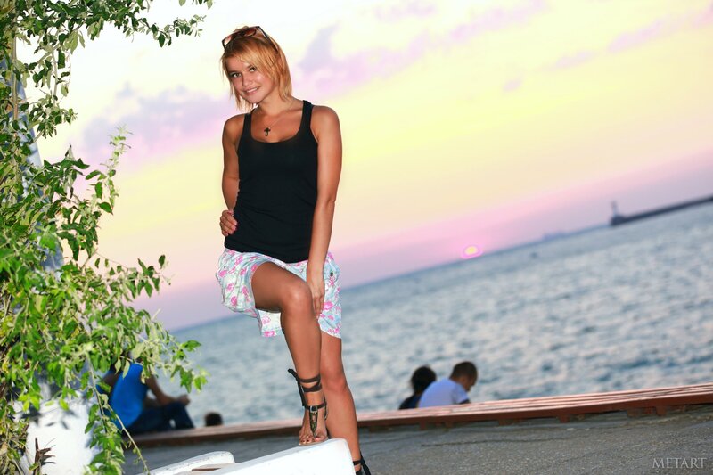 Woman at seaside sunset