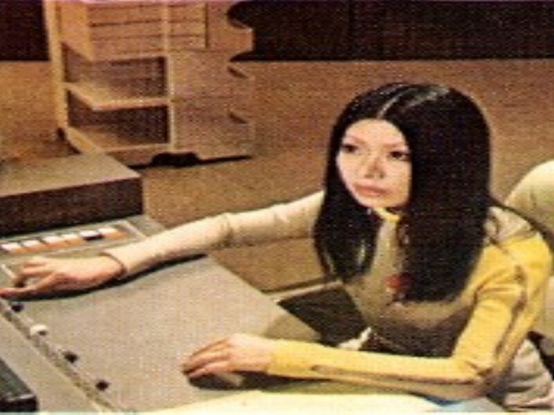 Woman at Sound Mixing Board