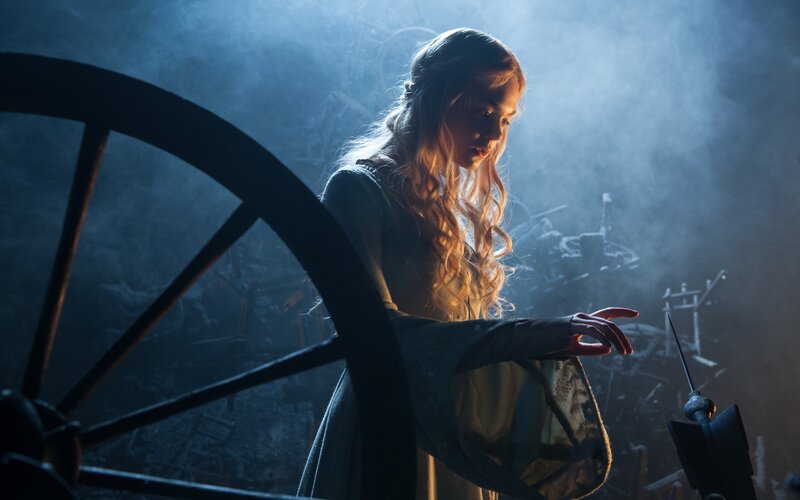 Woman at Spinning Wheel — Blue