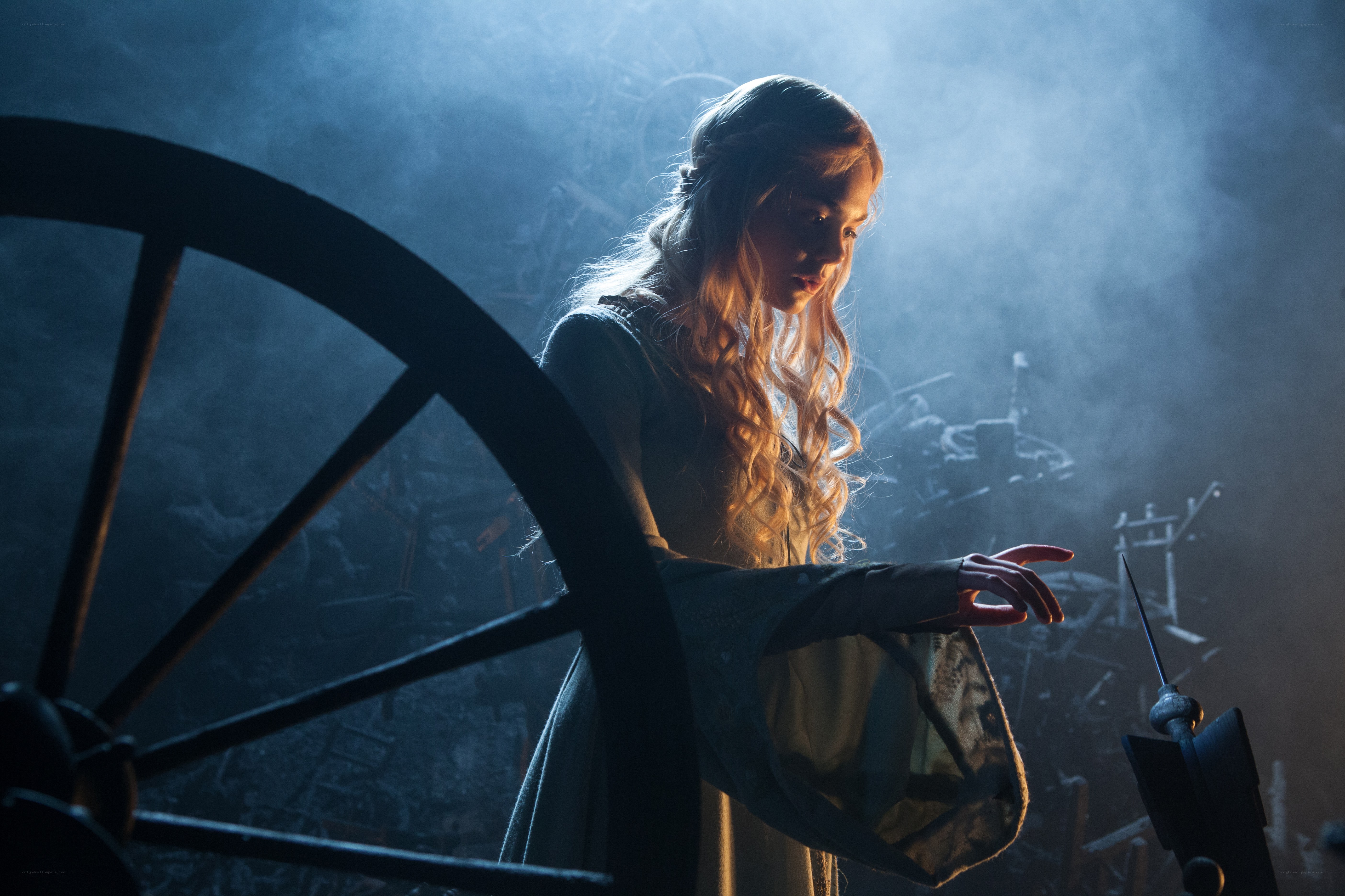 woman at spinning wheel
