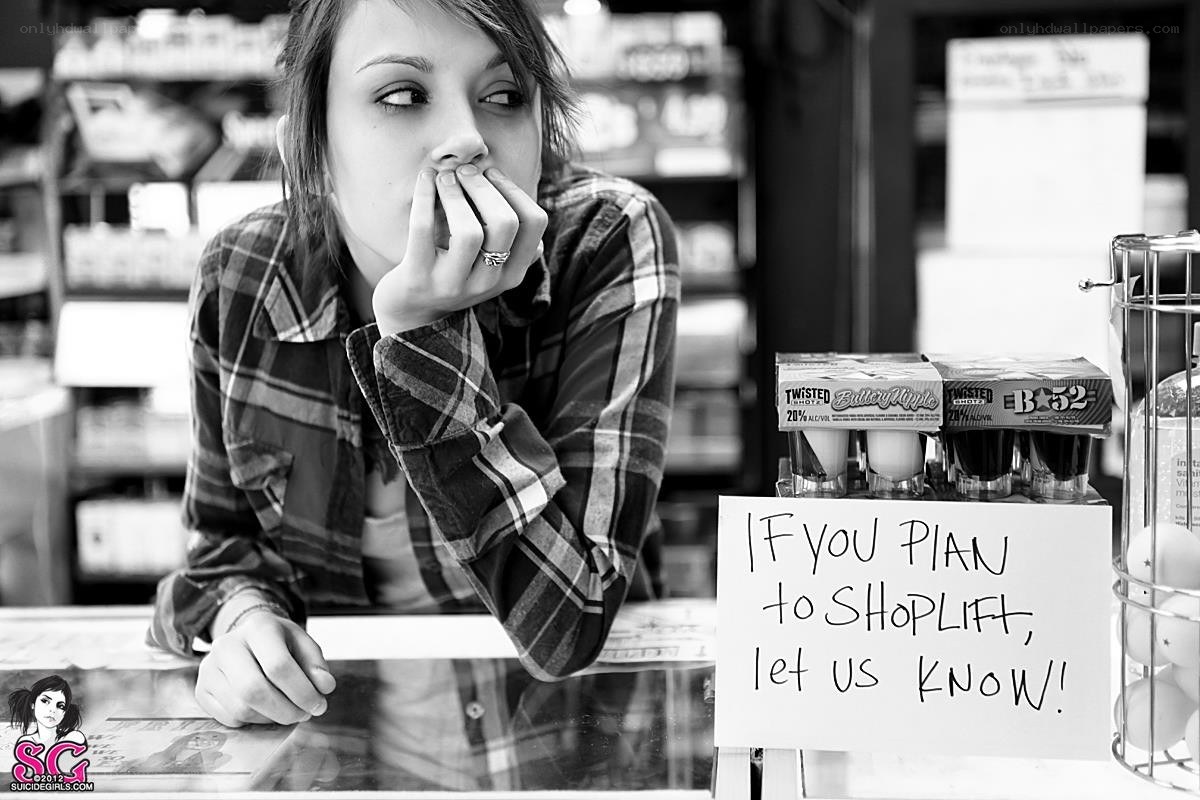Woman at store counter
