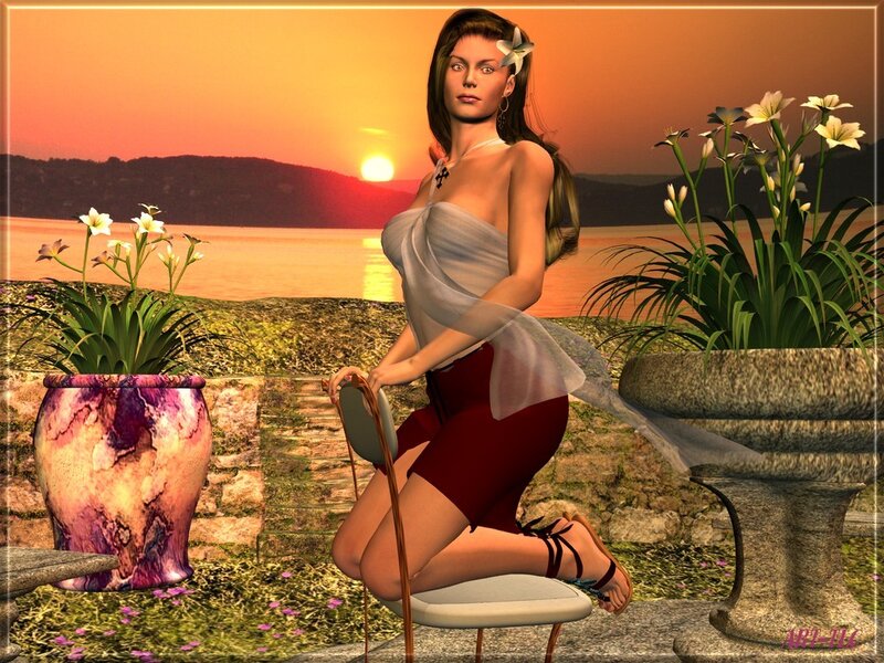 Woman at sunset by the sea