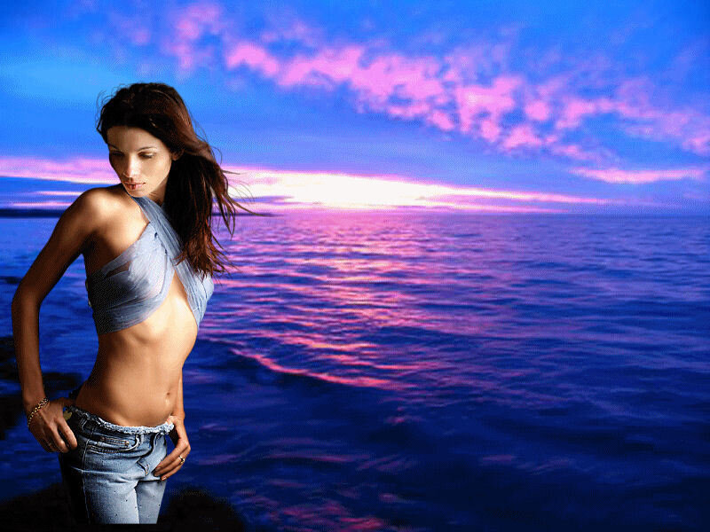 woman at sunset by the sea