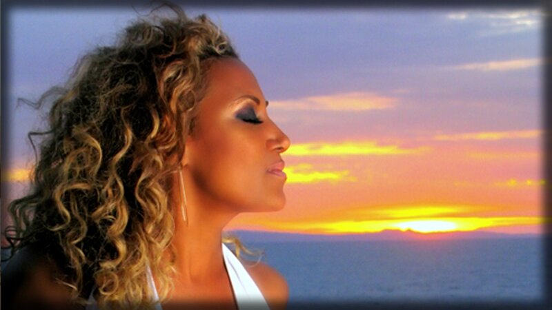 woman at sunset by the sea
