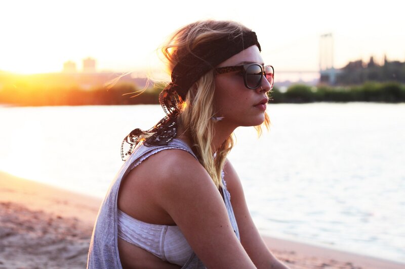 woman at sunset by the water