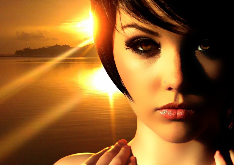 woman at sunset by water