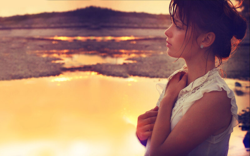 Woman at Sunset by Water — Orange