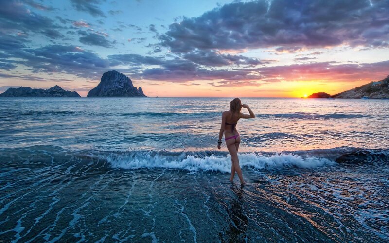Woman at sunset on beach