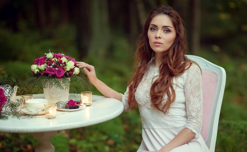 Woman at Table in Forest