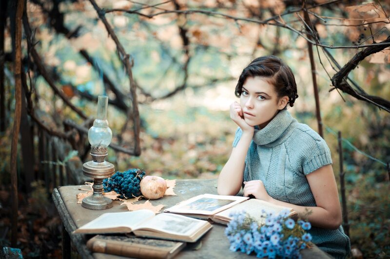 Woman at Table Outdoors