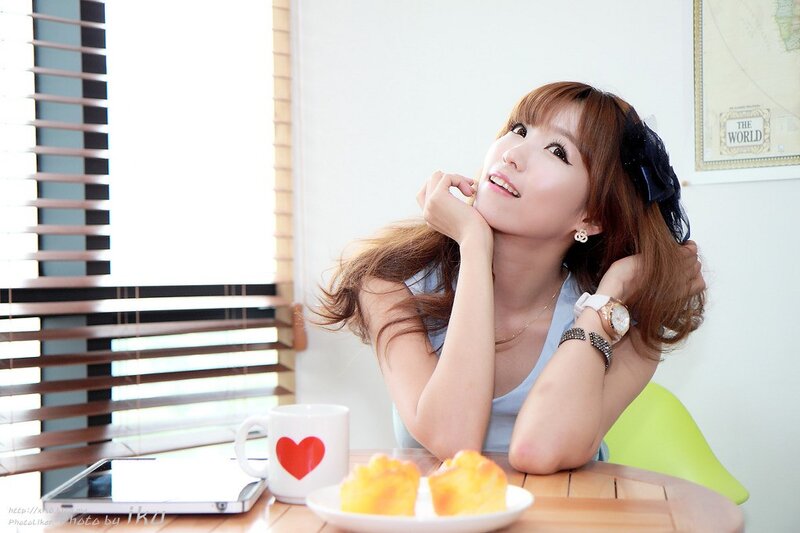 woman at table with pastries