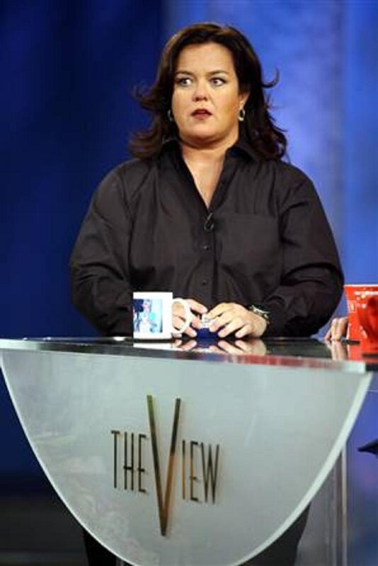 Woman at talk show desk