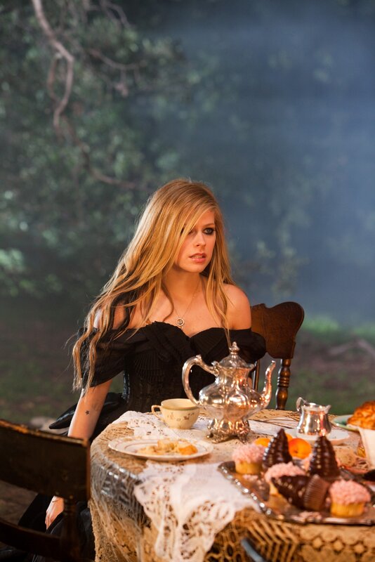 woman at tea party in forest