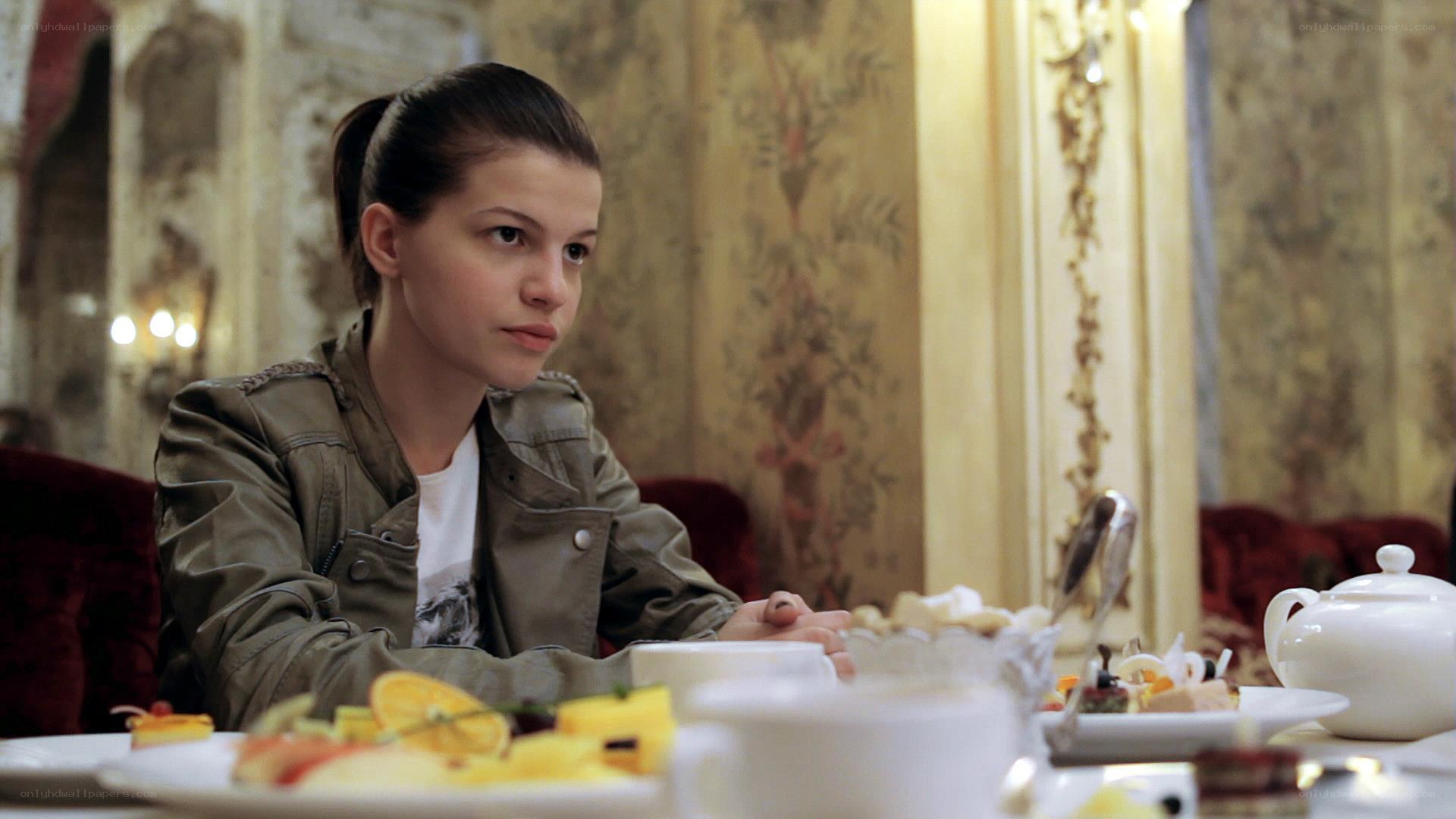 woman at tea table