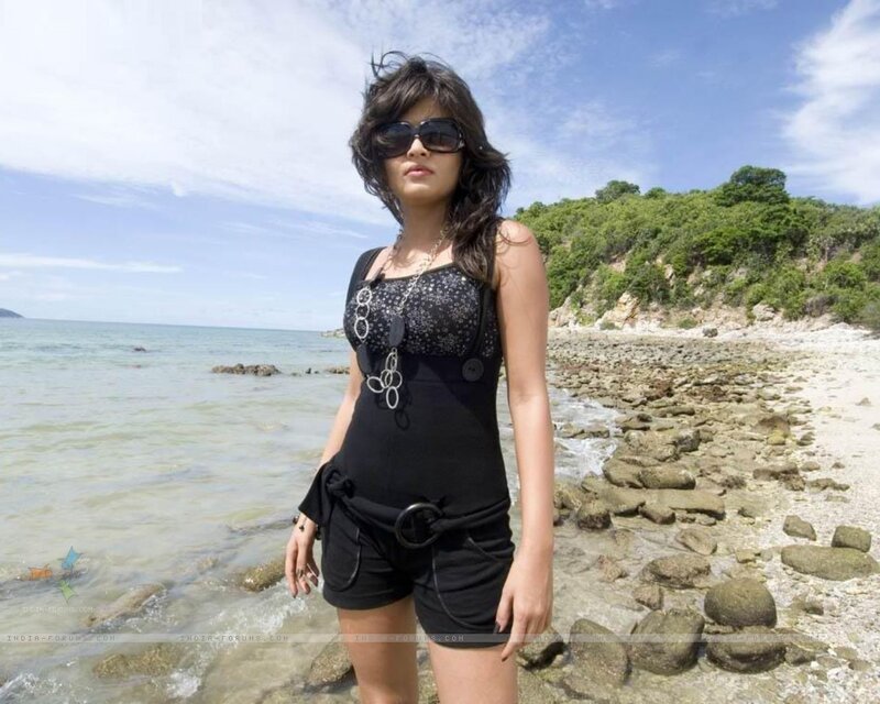 Woman at the beach in black outfit