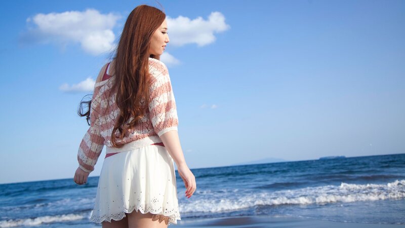 Woman at the beach in summer
