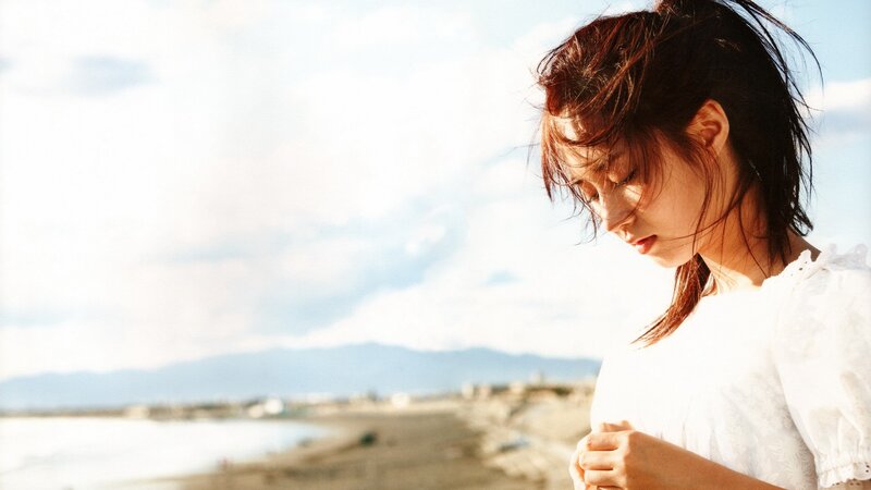 woman at the beach in sunlight