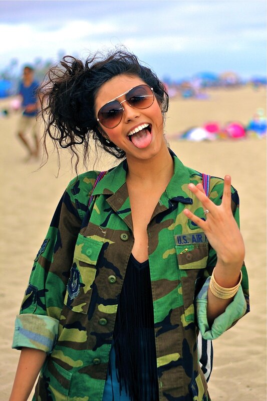 woman at the beach making a face