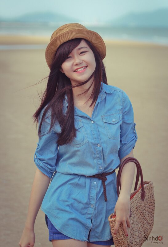 Woman at the beach smiling