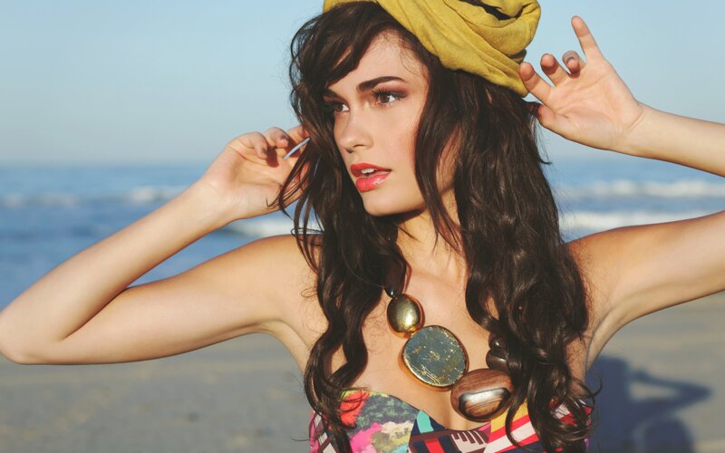 woman at the beach with headscarf