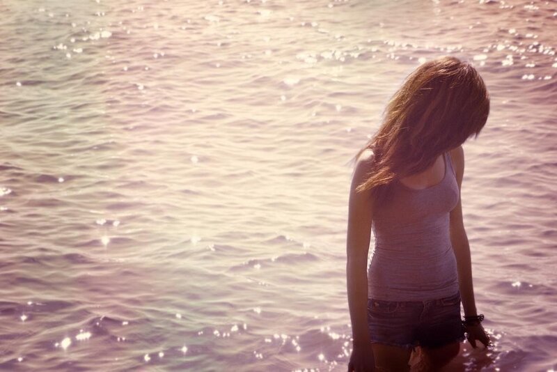 woman at the water's edge