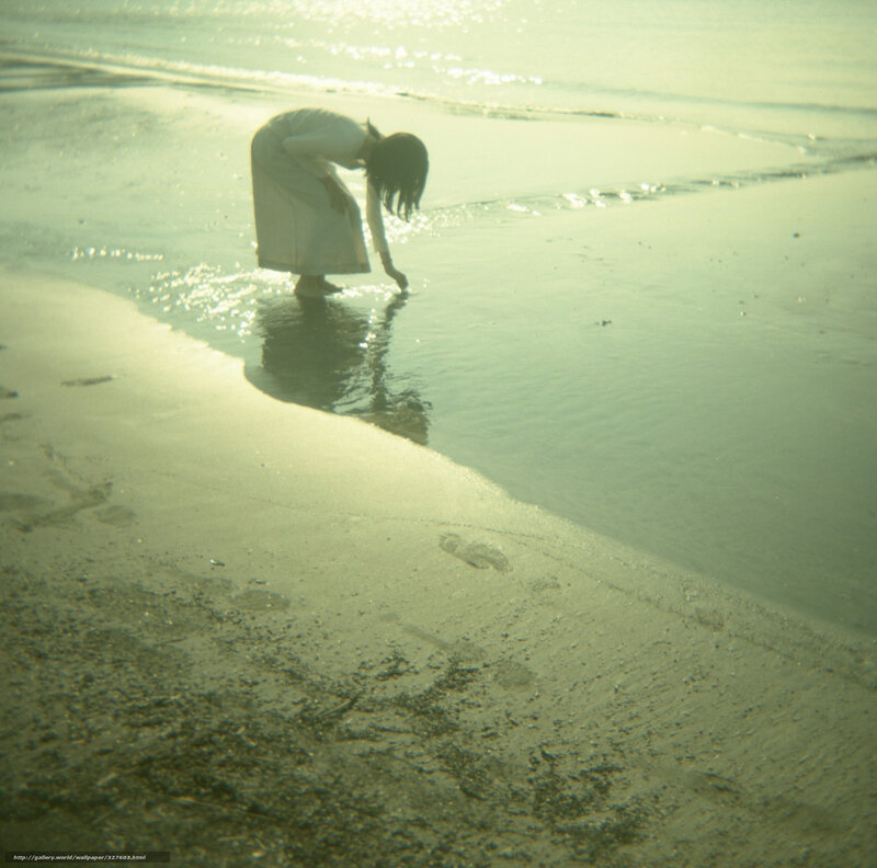 woman at the water's edge