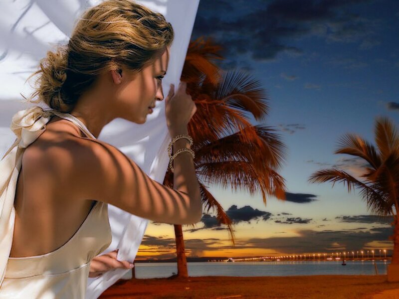 Woman at tropical sunset