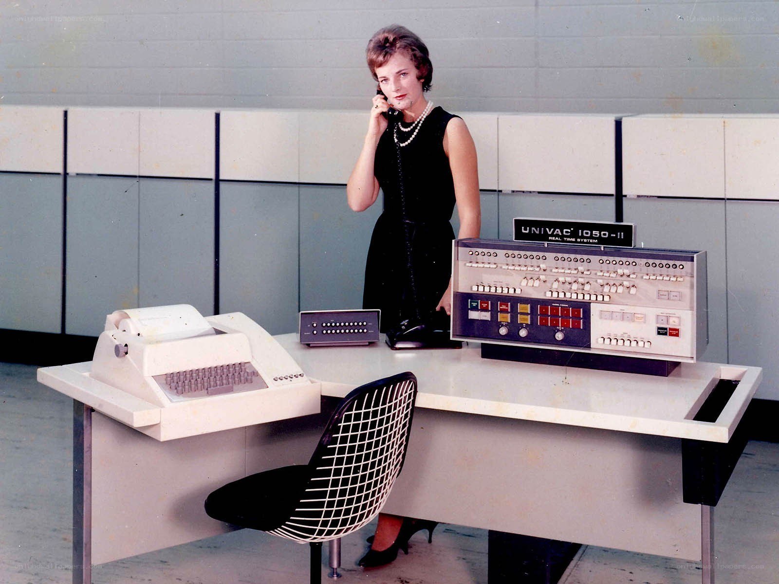 Woman at vintage computer console