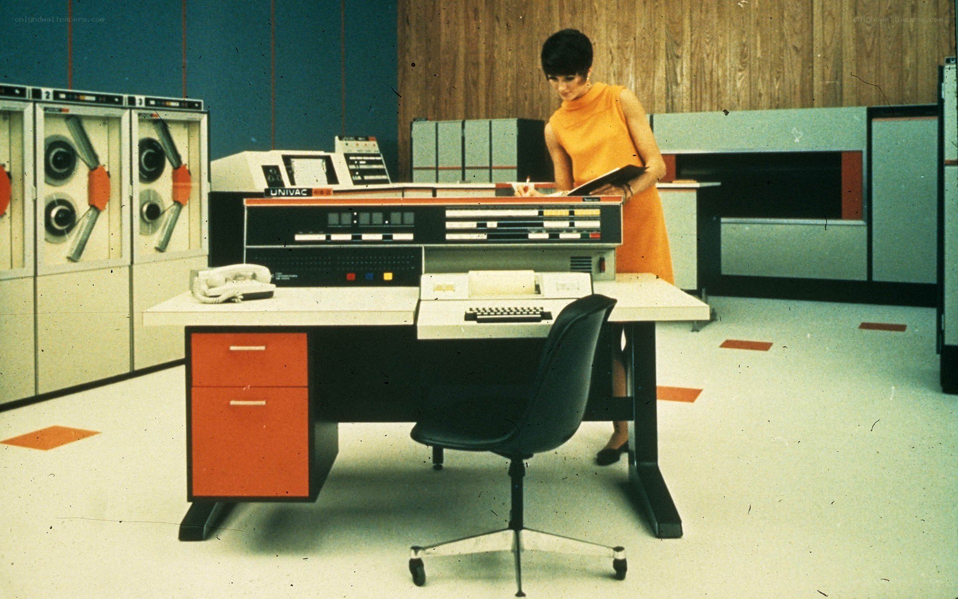 Woman at vintage computer workstation