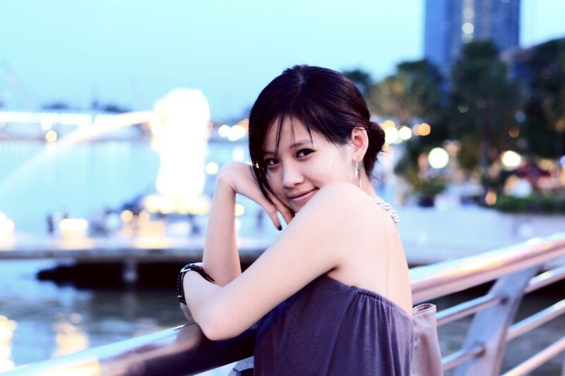 woman at waterfront in evening
