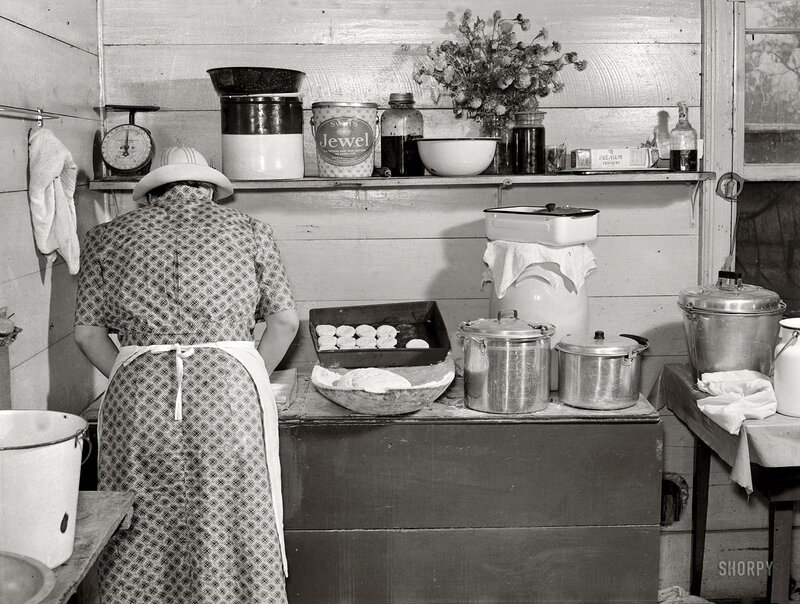 Woman baking in a rustic kitchen