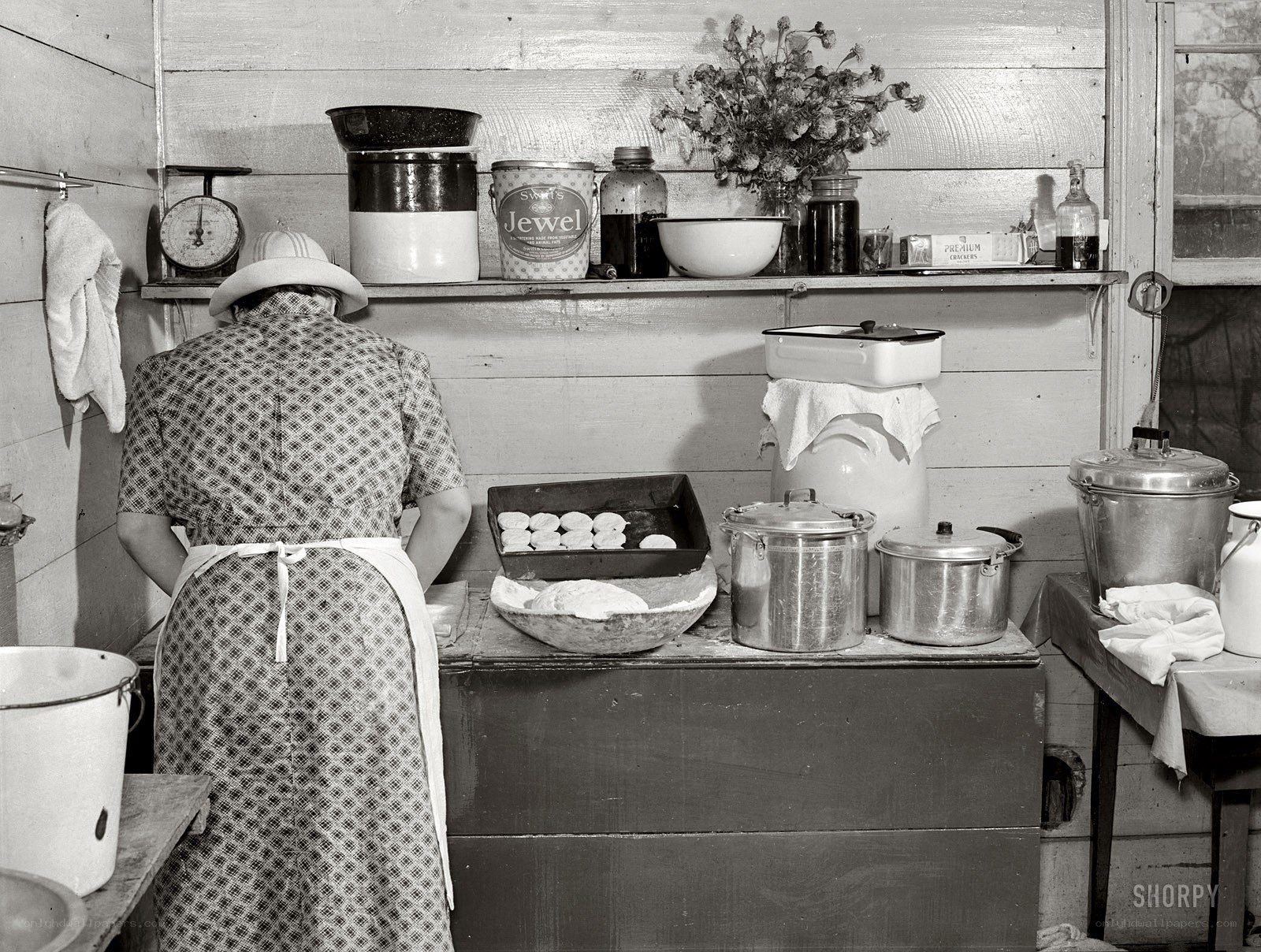 Woman baking in a rustic kitchen