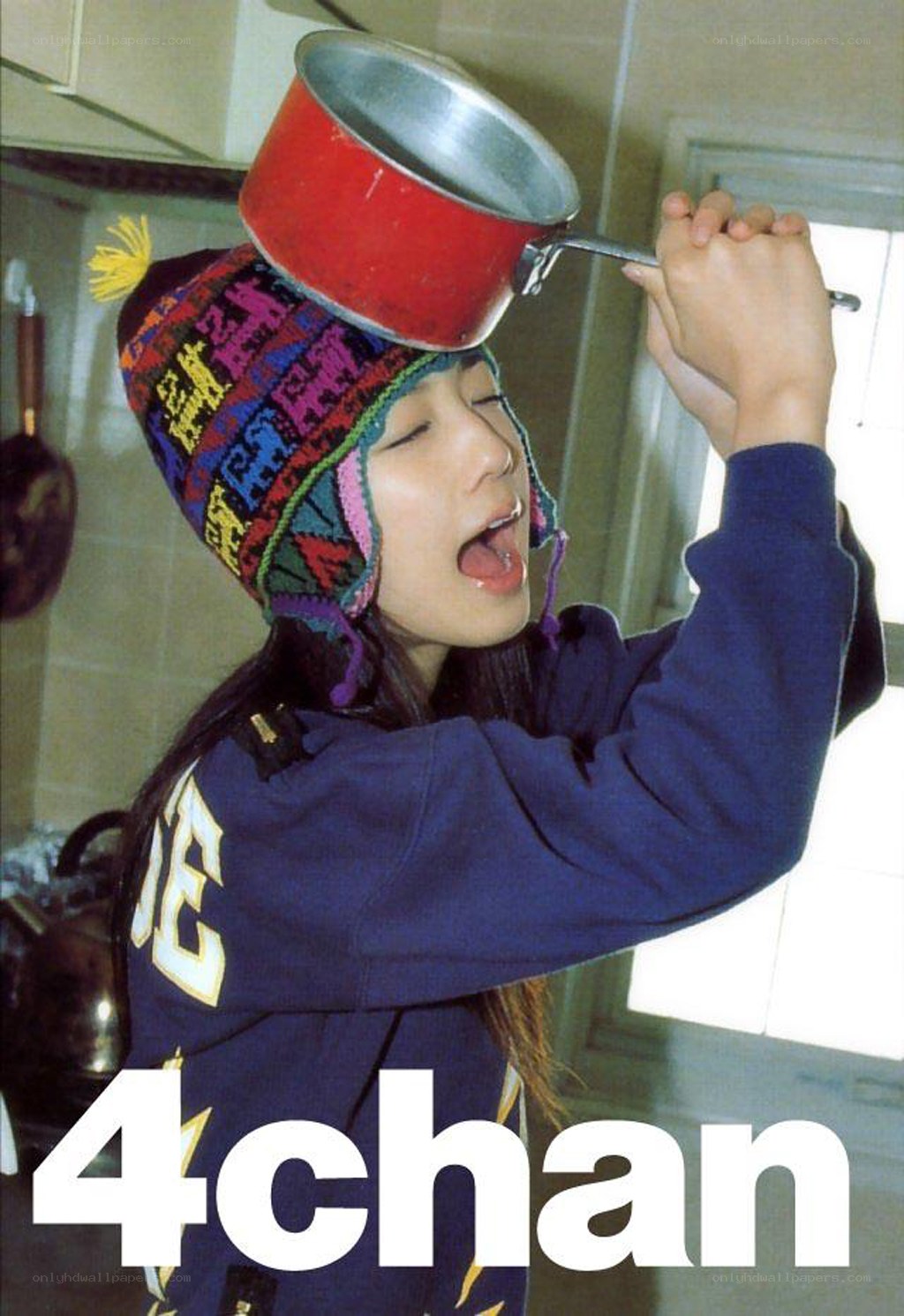 woman balancing pot on head