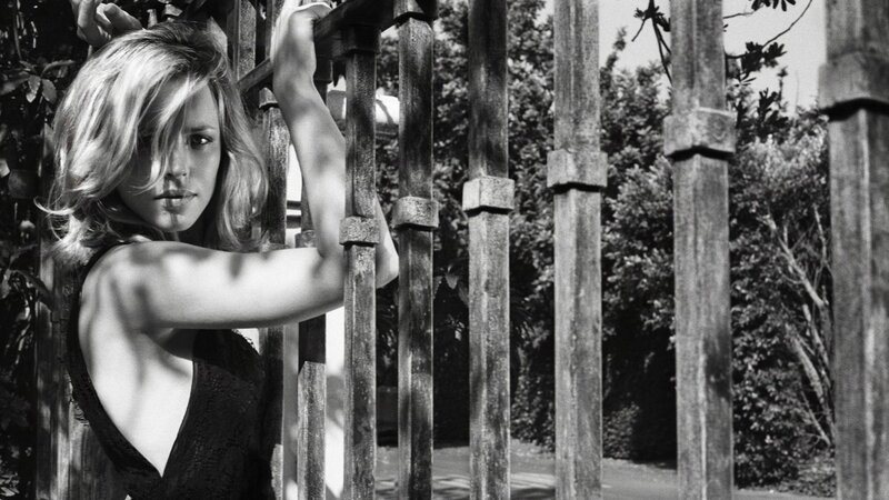 woman behind a fence