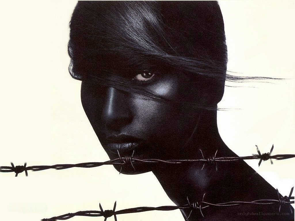 woman behind barbed wire