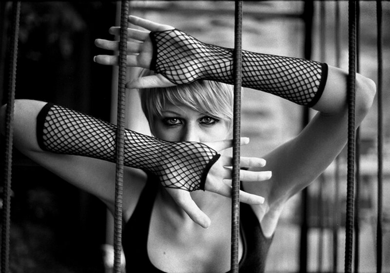 Woman Behind Bars — Black, Dramatic, Photograph