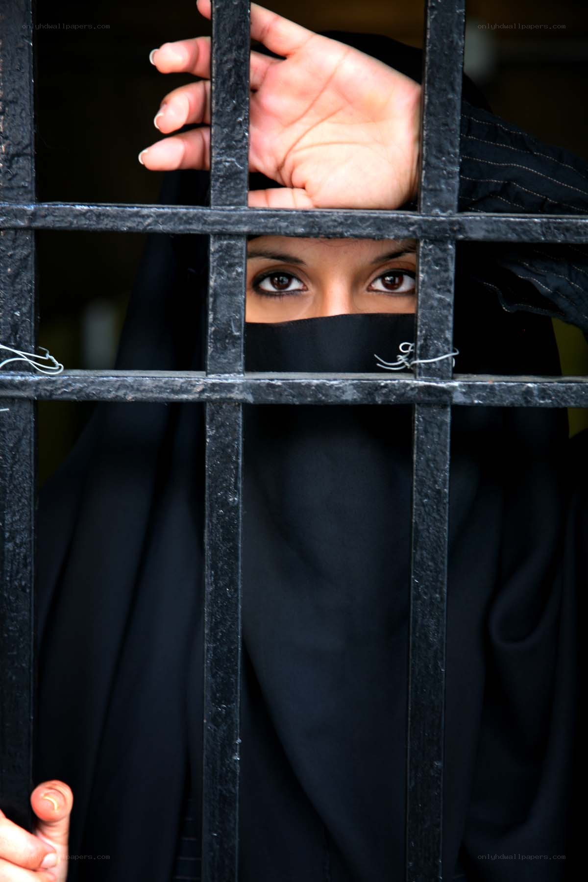 woman behind bars