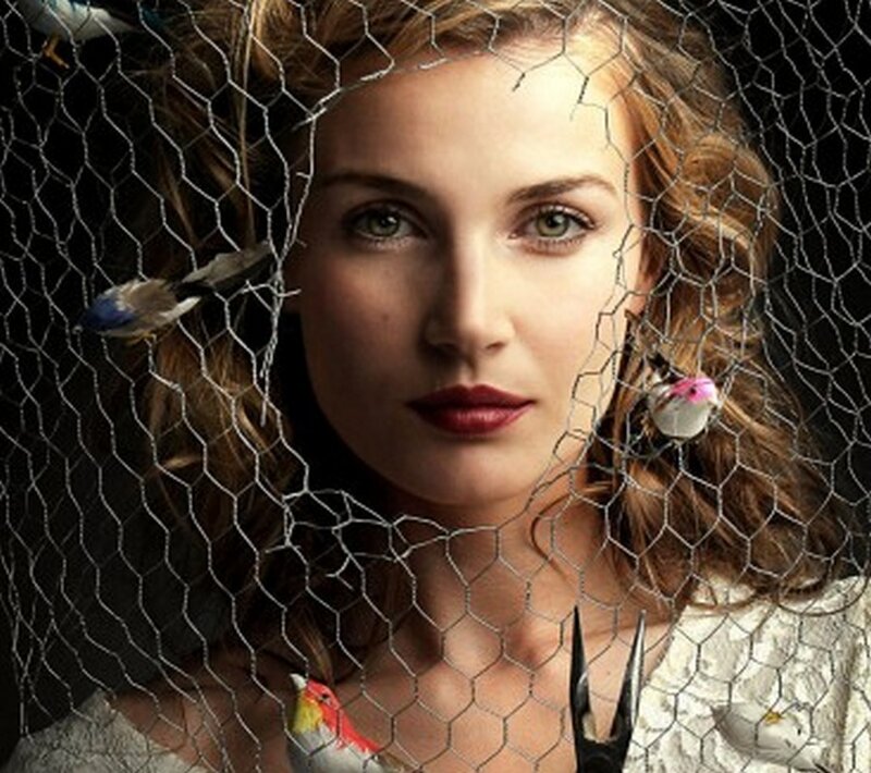 Woman Behind Chicken Wire