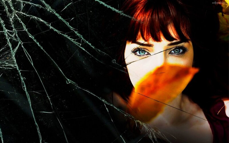 woman behind cracked glass