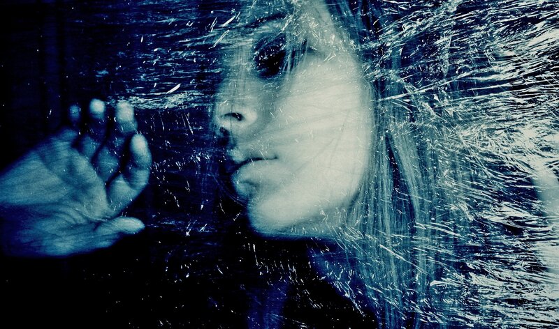 Woman Behind Cracked Glass — Blue